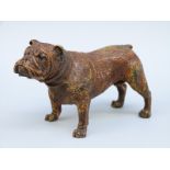 A bronze bulldog figure with Geschutzt mark to underside,