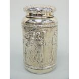 A German silver tea caddy with import marks for Chester 1905 and relief moulded decoration of