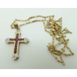 A 9ct gold chain made up of rectangular links with an 9ct gold cross pendant set with rubies and