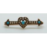An Edwardian brooch set with turquoise and pearls in the form of a heart,