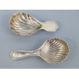 Two hallmarked silver caddy spoons of shell form, one Chester 1910, maker HF,