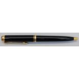 Pelikan ballpoint pen with gold plated mounts and black body