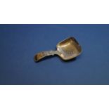 A George III silver caddy spoon, having wrigglework decoration to bowl, by Cox & Bettridge,