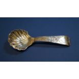 An early 19th century silver caddy spoon, probably by Thomas Wheatley of Newcastle,