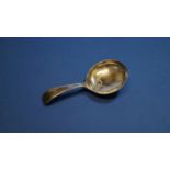 A George III silver tea caddy spoon, by I T, Birmingham 1799,