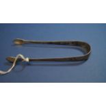 A pair of George III bright cut silver sugar tongs, by George Smith, London c1800, 14cm, 31g.