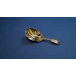 A Victorian silver fiddle pattern tea caddy spoon, having shell shaped bowl, by Robert Wallis,