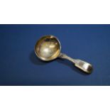 A Victorian silver fiddle pattern caddy spoon having chased decoration, by James Wintle ,