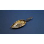 A 19th century silver leaf shaped caddy spoon, 8.3cm.