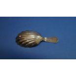 A George III silver caddy spoon, London 1790, having shell shaped bowl, 7cm.