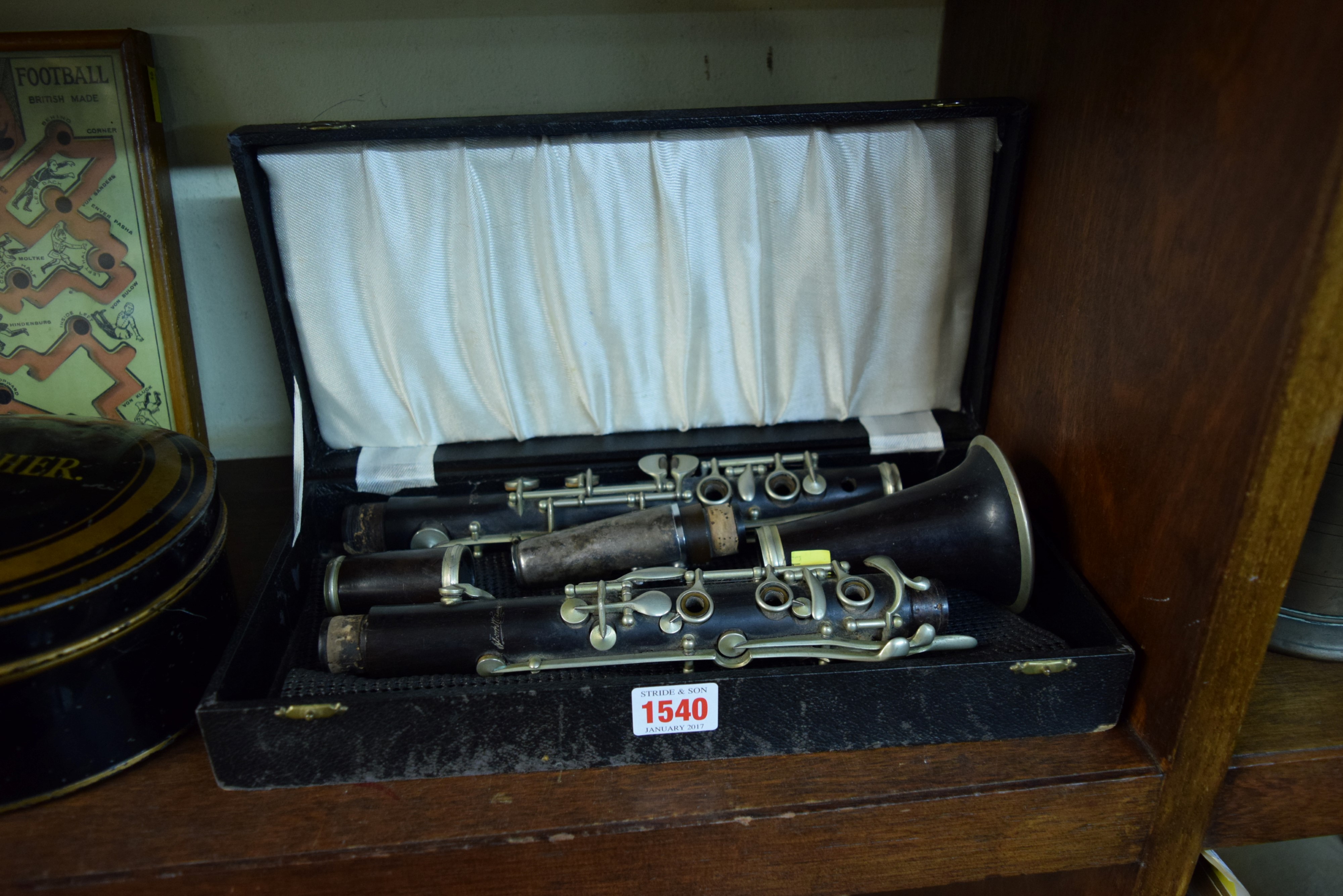 A hardwood and nickel plated clarinet, in box.