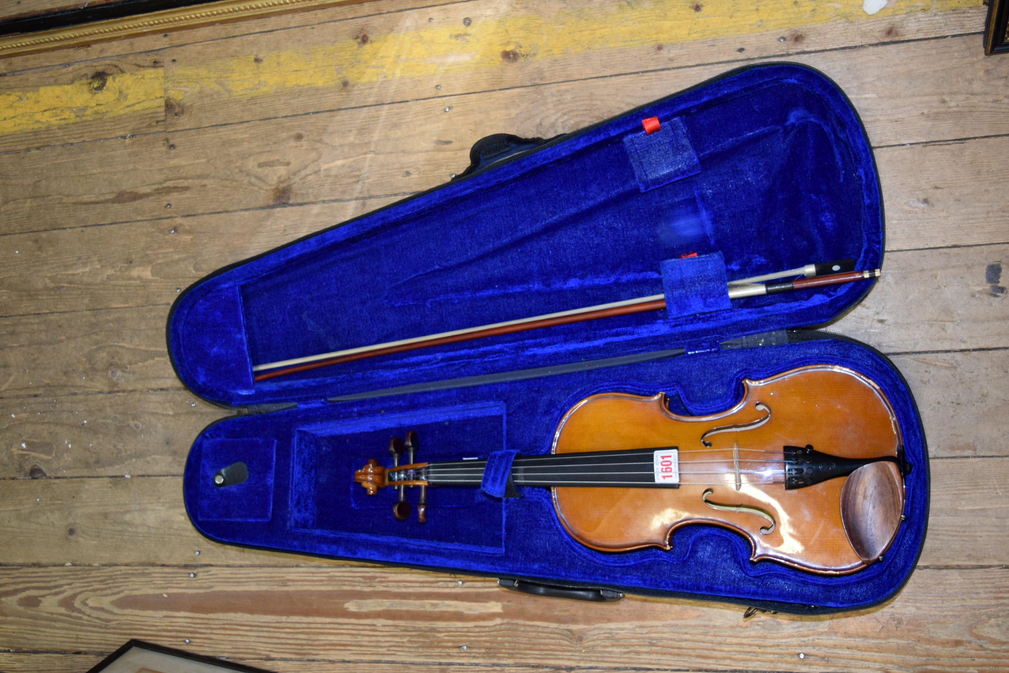 A Stentor Student violin, with 13 inch back, in padded case with bow.