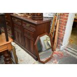 A circa 1900 mahogany carved side cabinet, 120.5cm wide.