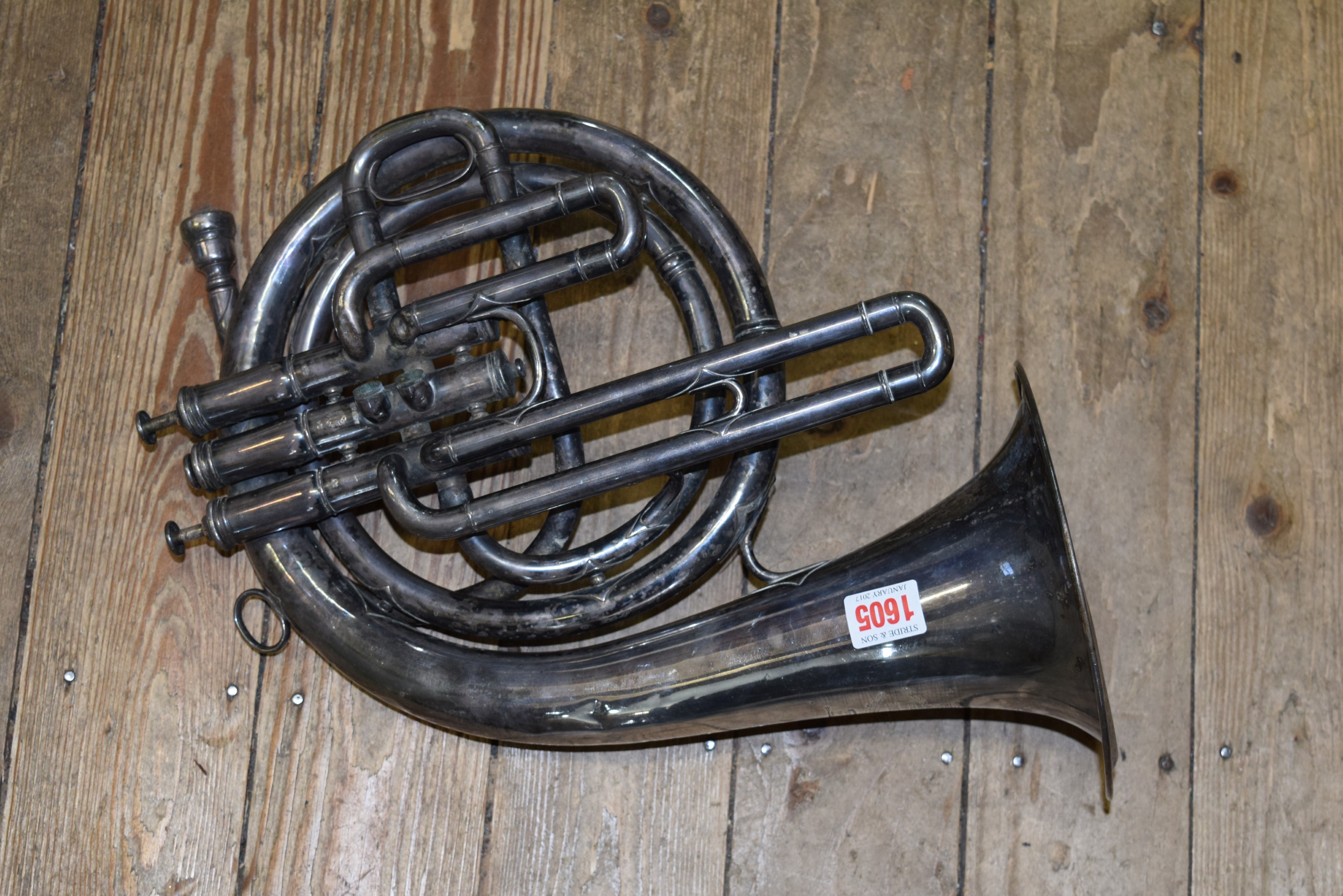 An electroplated French horn, by Distin & Co.