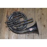 An electroplated French horn, by Distin & Co.