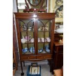 An Edwardian mahogany and crossbanded display cabinet, 91cm wide.