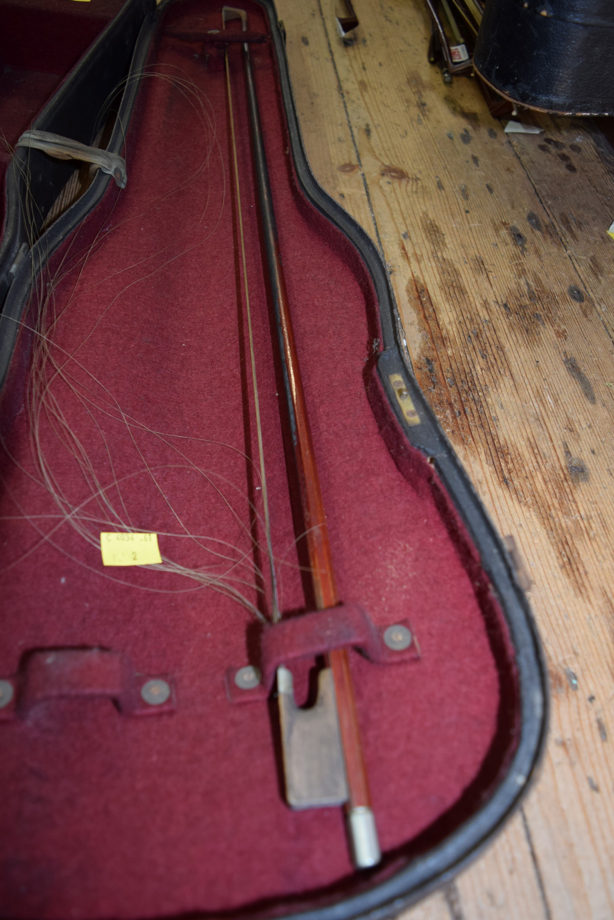 An antique Continental violin, with 14 inch back, cased and with bow. - Image 5 of 5