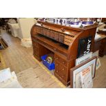 A Victorian mahogany roll top pedestal desk,