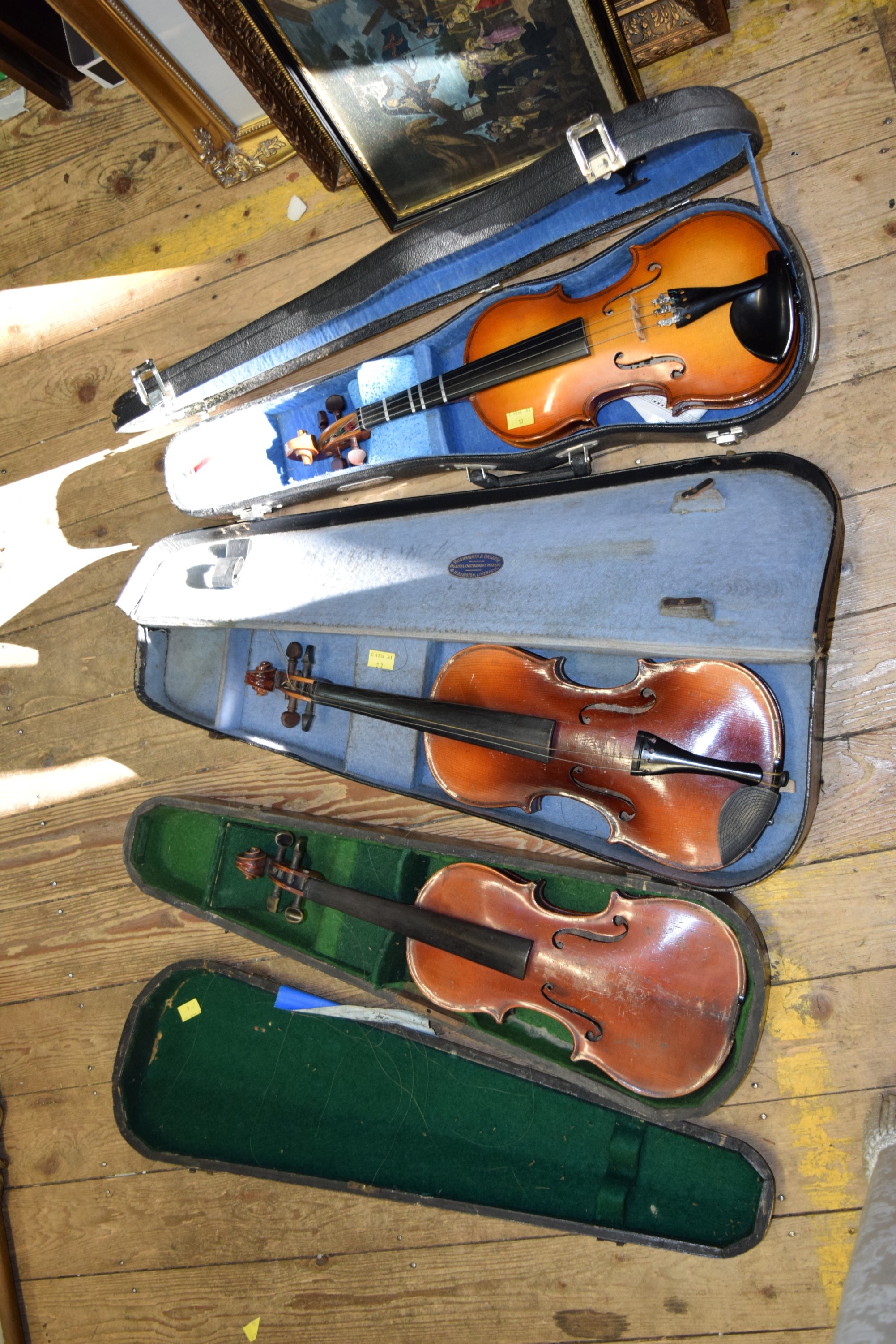 Three various violins, with 12, 12½ and 13 inch backs respectively, each boxed.