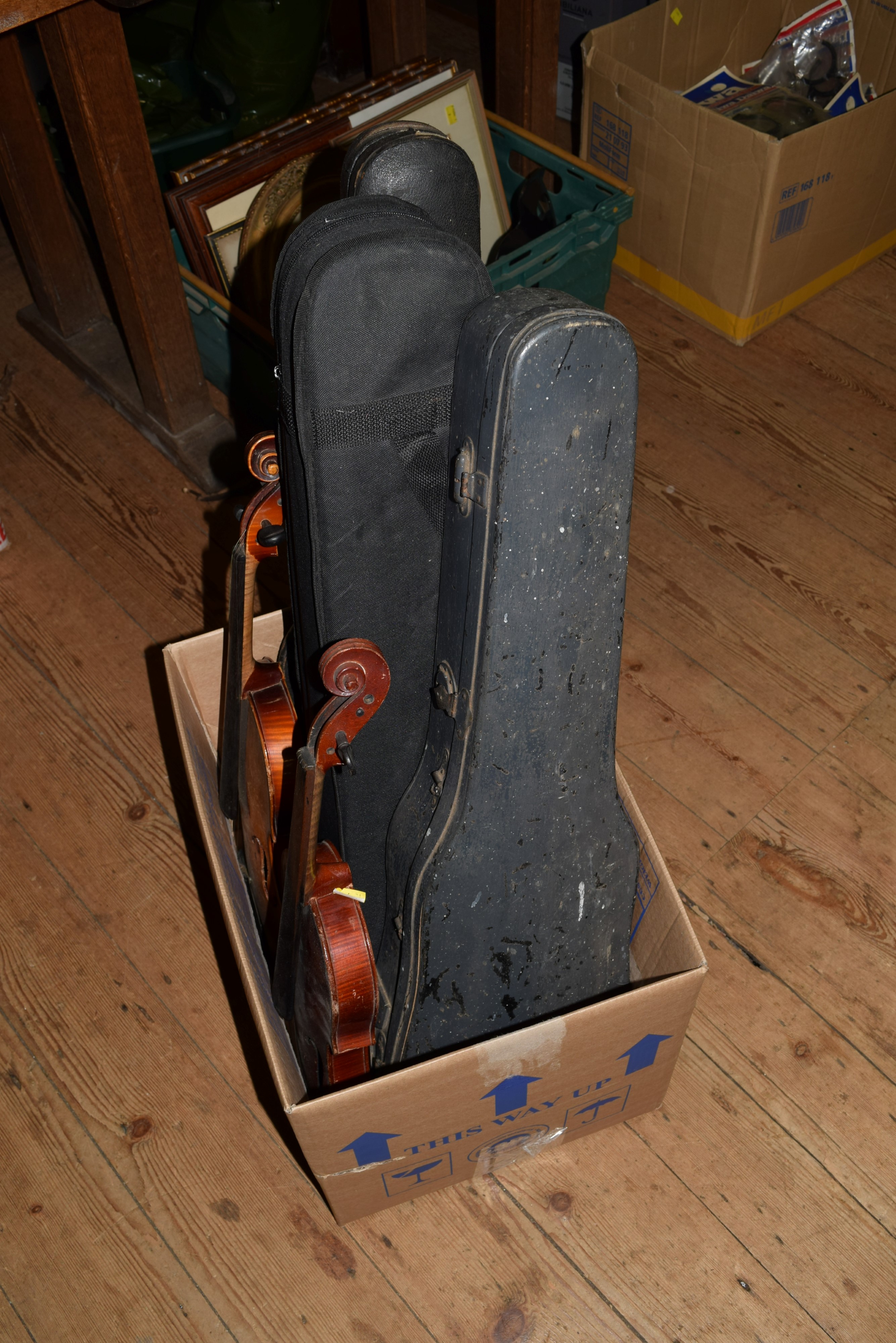 Five various violins, three cased.