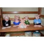 A set of five Wade 'Nat West' piggy banks.