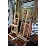 Two beechwood table top easels.