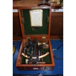 An antique mahogany cased sextant, the case labelled 'F Robson & Co'.