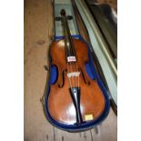 A German violin, with 14 inch back, cased and with bow.