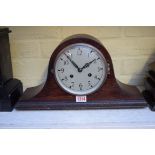 An early 20th century oak Wellington clock, 41cm wide.