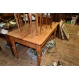 A Victorian pine kitchen table, with lateral frieze drawer, 124cm long.