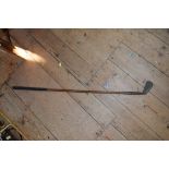 A vintage hickory shafted 'driving iron' golf club, by J P Cochrane & Co, Edinburgh.