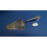 A George III silver fish slice, by Thomas Nash I, London 1768.