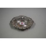 A reticulated silver bonbon bowl, by C J Vander Ltd, London 1973, having rococo decoration, 15.