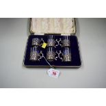 A cased set of six silver mounted liqueur glasses, by M.H & Co Ltd, Birmingham 1913.