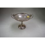 A silver twin handled tazza, Sheffield 1911, having pierced decoration to bowl, 394g,