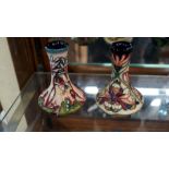 Two Moorcroft small vases, circa 2004, each tube lined with stylized flowers, 10.5cm high.