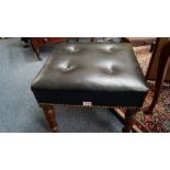 A Victorian walnut and buttoned leather stool.