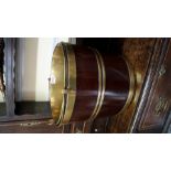 A George III mahogany and brass bound swing handled peat bucket, with brass liner, 32.5cm wide.