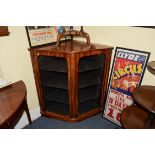 A pair of 19th century colonial hardwood standing corner cupboards, of serpentine fronted form,