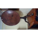 A George III mahogany tilt-top circular tripod table,