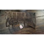 An antique wicker small fish trap, 37cm long.