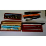 Pens: a small quantity of fountain pens.