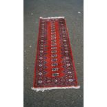 A Pakistan Bokhara small runner, 173 x 63cm.