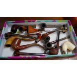 A collection of briarwood and similar pipes; together with hat pins.