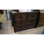 A circa 1900 oak chest of drawers, by Liberty & Co, labelled and stamped '26', 106.5cm wide.