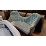 A good Victorian carved walnut and button upholstered shaped back settee,