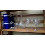 A pair of etched glass decanters and stoppers;