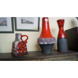 Two West German pottery vases; and a similar jug, largest 32.5cm high.