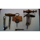 A collection of six various vintage corkscrews,