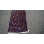 A baluch prayer rug having allover geometric field prayer niche, 150 x 85cm.